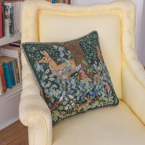 Woodland Cushion (dark) on yellow chair